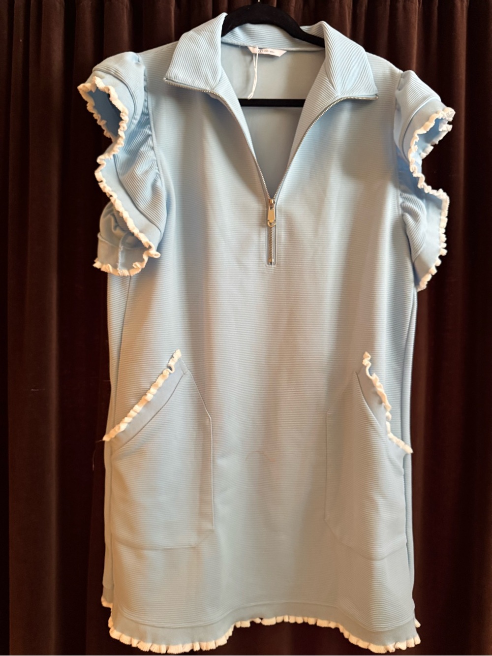 Cicy Bell Light Blue Ribbed Dress with Ruffled Sleeves and Hem.